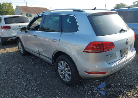 2014 Volkswagen Touareg 3.6L Sport from USA, damaged, VIN WVGEF9BPXED005687
